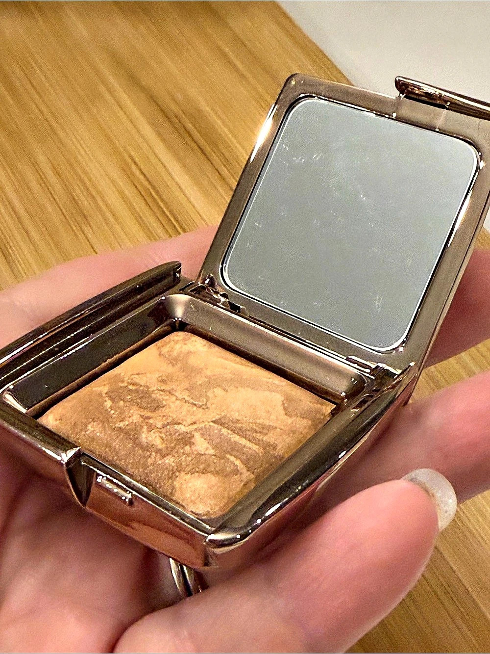 Hourglass Ambient Lighting Bronzer in Luminous Bronze Light Medium W/ Champagne